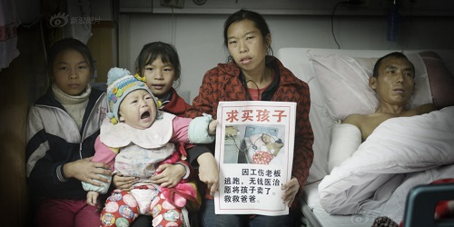 Ni Hong bersama anak dan suaminya.(thatsmags.com)